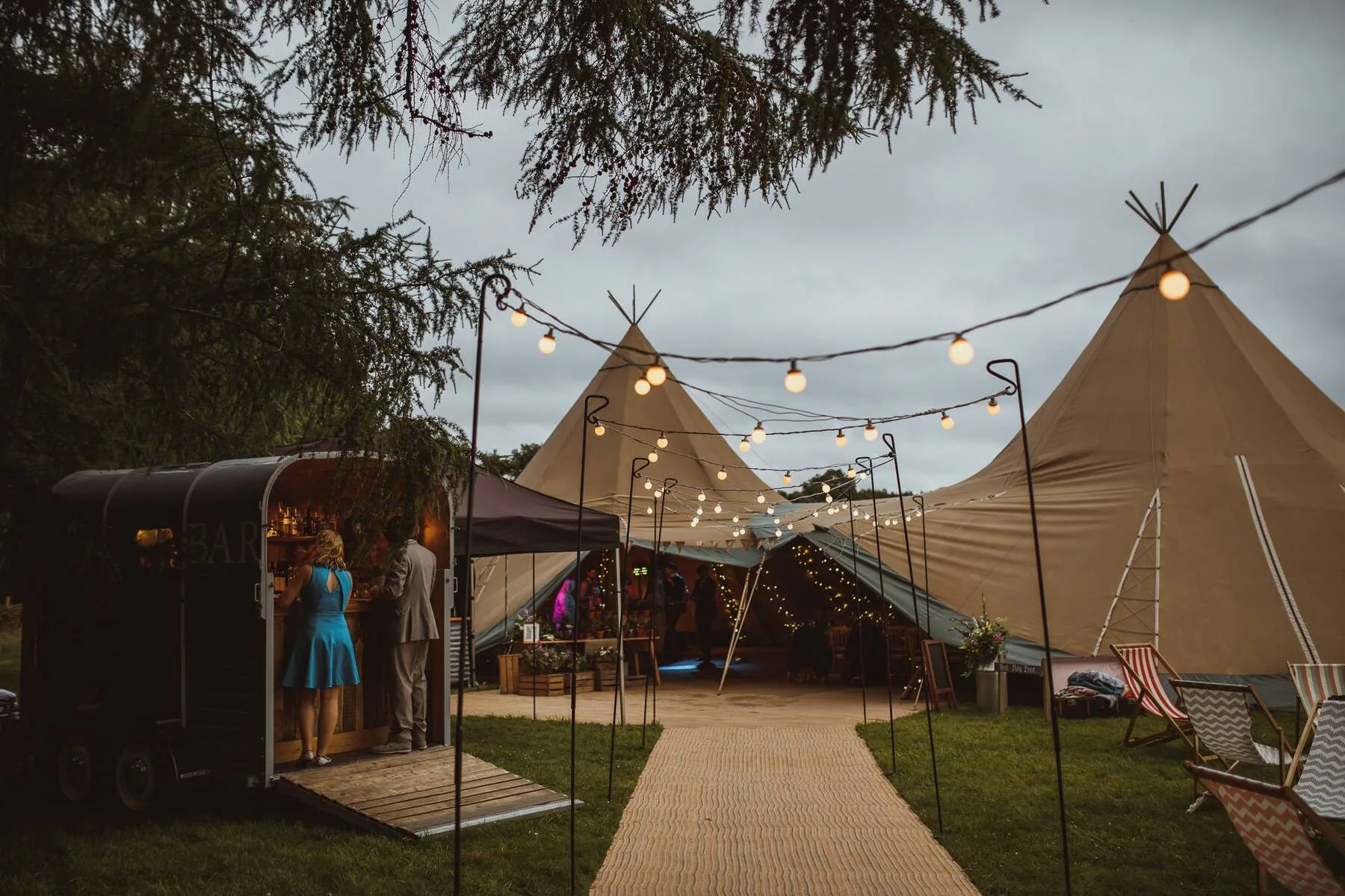 Evening tipi wedding with fairy lights